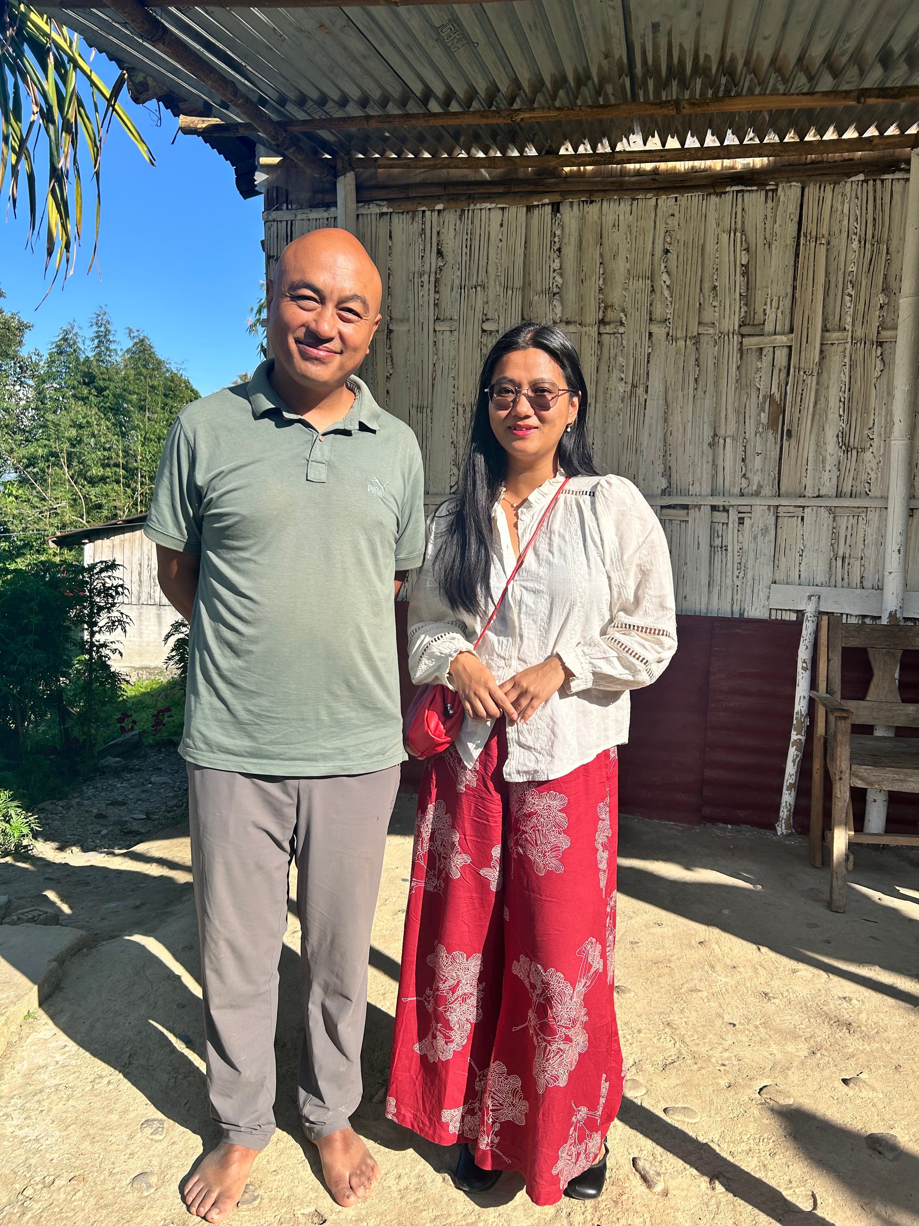 Sonam and Swikriti outside the house where the Spring Blossom harvest is made